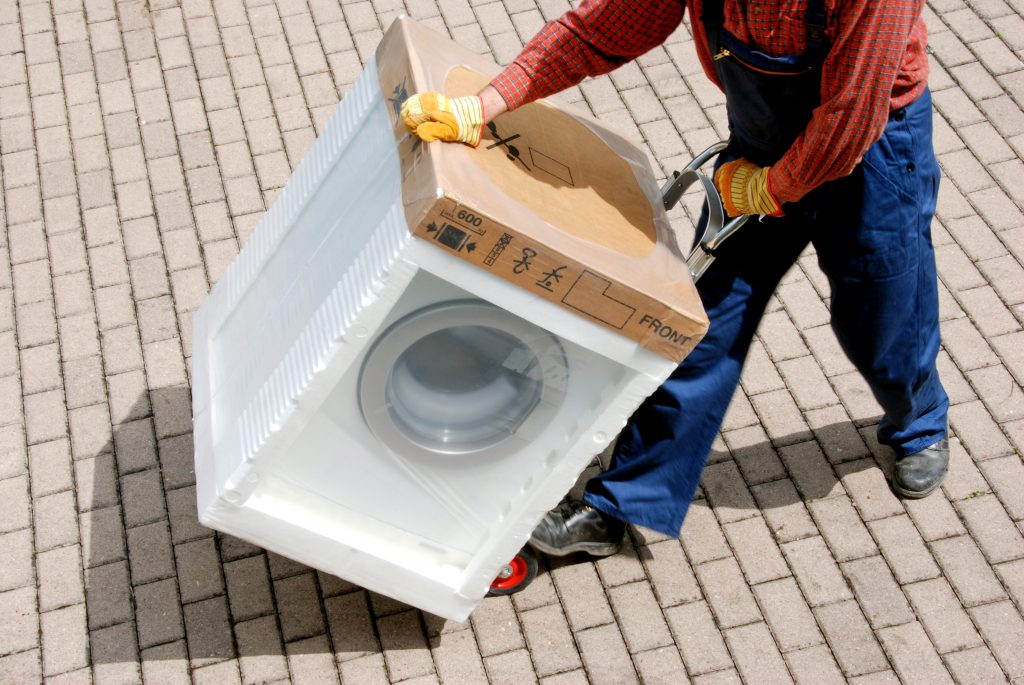 What is the best way to transport a front-load washing machine