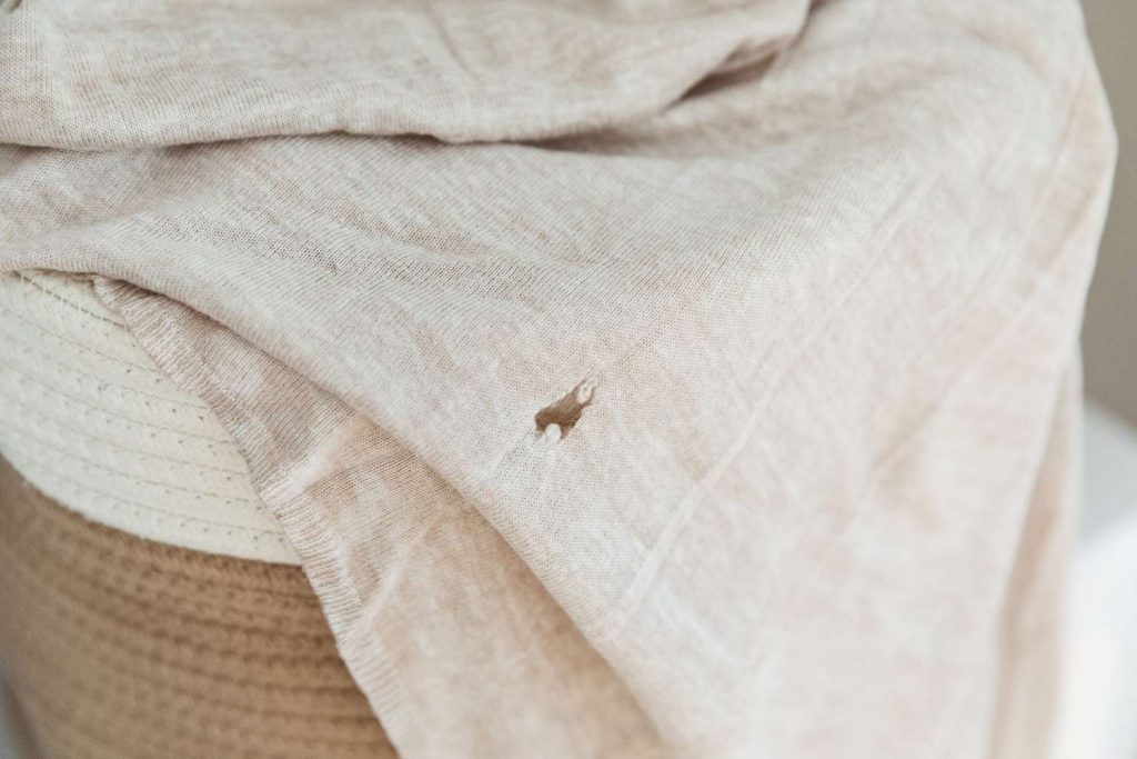 What Causes Small Holes in Clothes After Washing